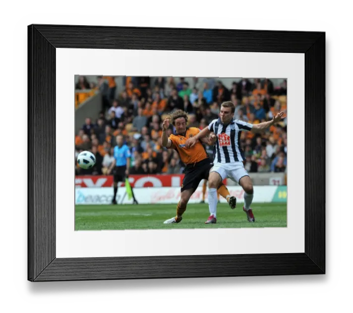 Framed Print : Wolverhampton Wanderers vs West Bromwich Albion: A Clash of Football Titans - Stephen Hunt vs James Morrison: Midfield Battle Framed Print : Wolverhampton Wanderers vs West Bromwich Albion: A Clash of Football Titans - Stephen Hunt vs James Morrison: Midfield Battle