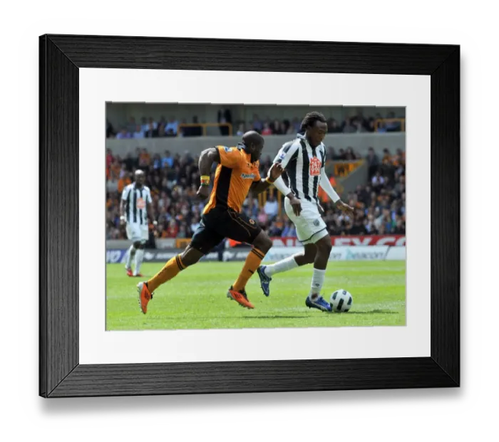 Framed Print : Clash of the Midlands: Elokobi vs. Tchoyi in the Barclays Premier League - Wolverhampton Wanderers vs. West Bromwich Albion Framed Print : Clash of the Midlands: Elokobi vs. Tchoyi in the Barclays Premier League - Wolverhampton Wanderers vs. West Bromwich Albion