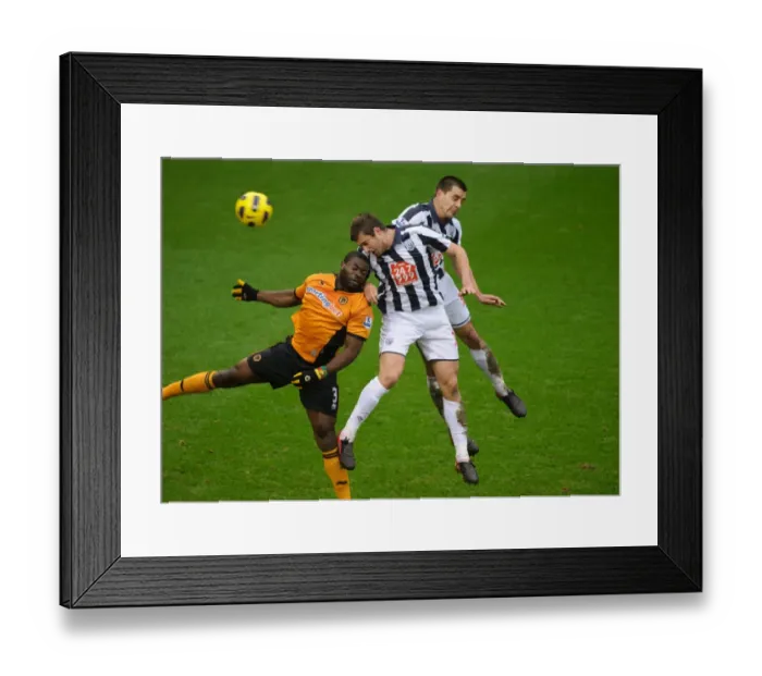 Framed Print : Clash of the Midlands: Elokobi, Tamas, and Scharner in Action - West Bromwich Albion vs. Wolverhampton Wanderers, Barclays Premier League Framed Print : Clash of the Midlands: Elokobi, Tamas, and Scharner in Action - West Bromwich Albion vs. Wolverhampton Wanderers, Barclays Premier League