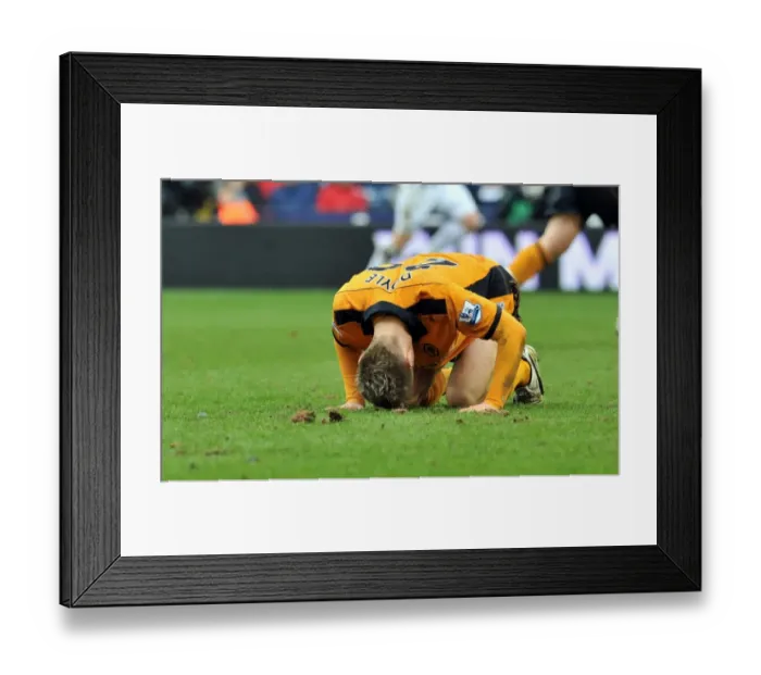 Framed Print : Wolverhampton Wanderers Kevin Doyle Doubled Over in Pain from Jonas Olsson's Crushing Knee to the Ribs (West Bromwich Albion vs. Wolves) Framed Print : Wolverhampton Wanderers Kevin Doyle Doubled Over in Pain from Jonas Olsson's Crushing Knee to the Ribs (West Bromwich Albion vs. Wolves)