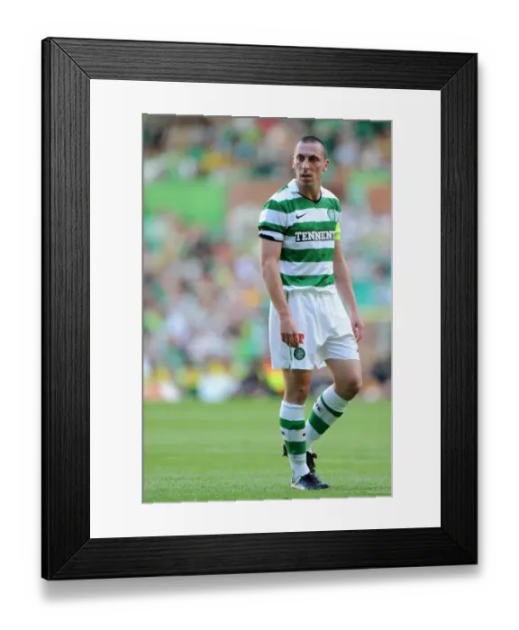 Framed Print : Scott Brown vs. Wolverhampton Wanderers: A Clash of Captains in Pre-Season Football Action
