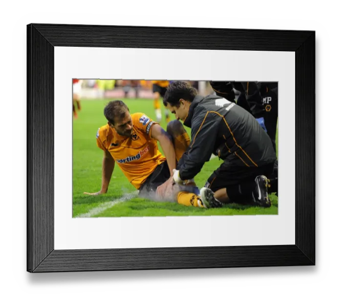 Framed Print : Wolverhampton Wanderers Roger Johnson Suffers Injury in Pre-Season Friendly Against Walsall Framed Print : Wolverhampton Wanderers Roger Johnson Suffers Injury in Pre-Season Friendly Against Walsall