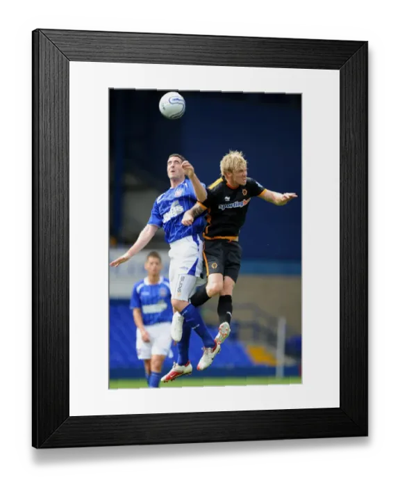 Framed Print : Mark Kennedy vs. Andy Keogh: A Fierce Pre-Season Rivalry - Ipswich Town vs. Wolverhampton Wanderers
