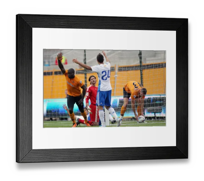 Framed Print : George Elokobi Scores the Opener for Wolverhampton Wanderers Against Real Zaragoza Framed Print : George Elokobi Scores the Opener for Wolverhampton Wanderers Against Real Zaragoza