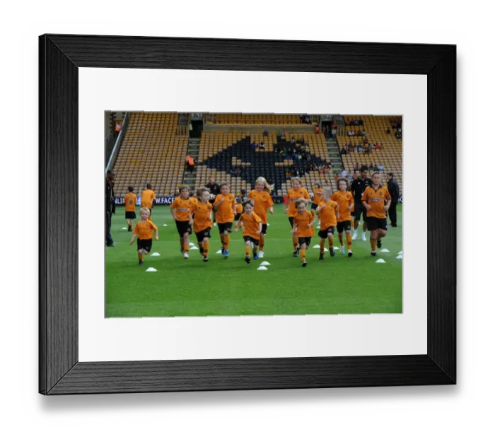 Framed Print : Wolverhampton Wanderers: Matchday Mascots Gearing Up for Battle - Wolves vs. Real Zaragoza Framed Print : Wolverhampton Wanderers: Matchday Mascots Gearing Up for Battle - Wolves vs. Real Zaragoza