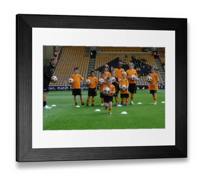 Framed Print : Wolverhampton Wanderers Matchday Mascots: Pre-Game Training - Wolves vs. Real Zaragoza Framed Print : Wolverhampton Wanderers Matchday Mascots: Pre-Game Training - Wolves vs. Real Zaragoza