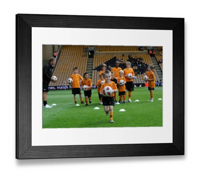 Framed Print : Wolverhampton Wanderers Matchday Mascots Training on the Pitch: Wolves vs Real Zaragoza