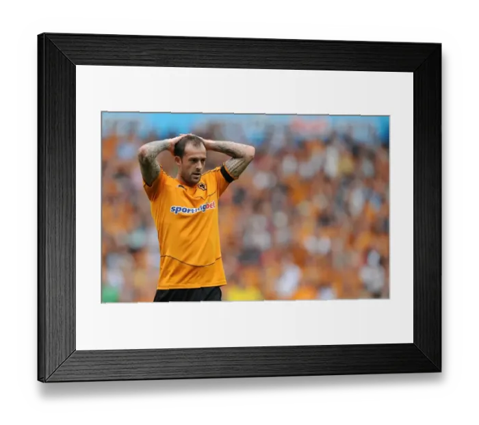 Framed Print : Steven Fletcher Leads Wolverhampton Wanderers in Premier League Clash against Fulham