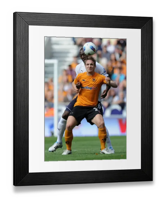 Framed Print : Clash of Titans: Kevin Doyle vs. Ledley King - Wolverhampton Wanderers vs. Tottenham Hotspur, Barclays Premier League Framed Print : Clash of Titans: Kevin Doyle vs. Ledley King - Wolverhampton Wanderers vs. Tottenham Hotspur, Barclays Premier League