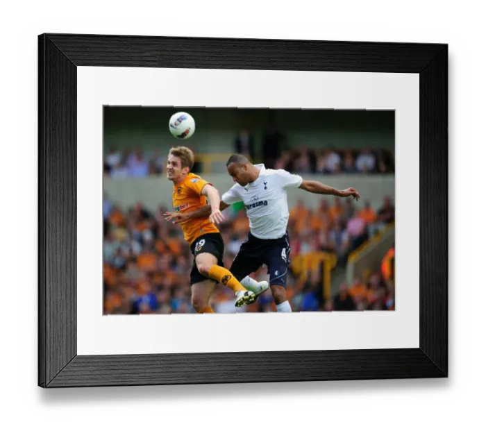 Framed Print : Clash of Titans: Kevin Doyle vs. Younes Kaboul - Wolverhampton Wanderers vs. Tottenham Hotspur, Barclays Premier League