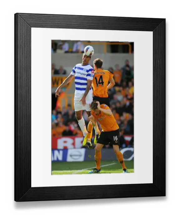 Framed Print : Three Titans Clash: A Tense Battle between Wolverhampton Wanderers Johnson, Bothroyd, and Berra in the Wolves vs. Queens Park Rangers Showdown Framed Print : Three Titans Clash: A Tense Battle between Wolverhampton Wanderers Johnson, Bothroyd, and Berra in the Wolves vs. Queens Park Rangers Showdown