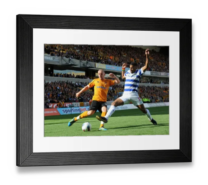 Framed Print : Intense Clash: Jamie O'Hara vs. Armand Traore - Wolverhampton Wanderers vs. Queens Park Rangers, Premier League Soccer Framed Print : Intense Clash: Jamie O'Hara vs. Armand Traore - Wolverhampton Wanderers vs. Queens Park Rangers, Premier League Soccer