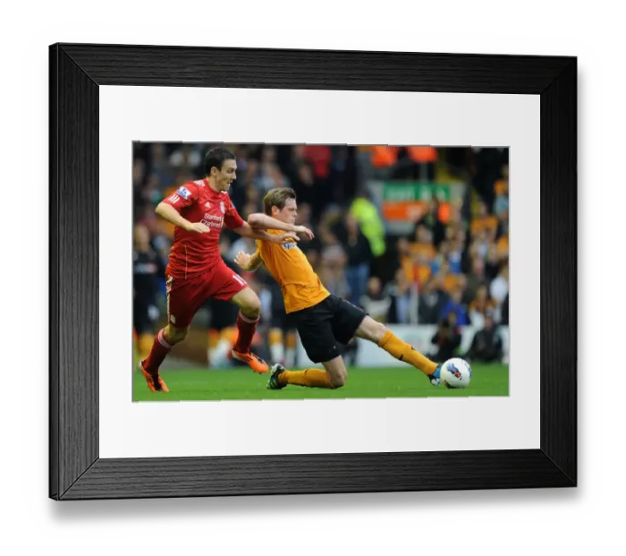 Framed Print : Stearman vs Downing: A Premier League Showdown - Intense Rivalry between Wolverhampton Wanderers Richard Stearman and Liverpool's Stewart Downing