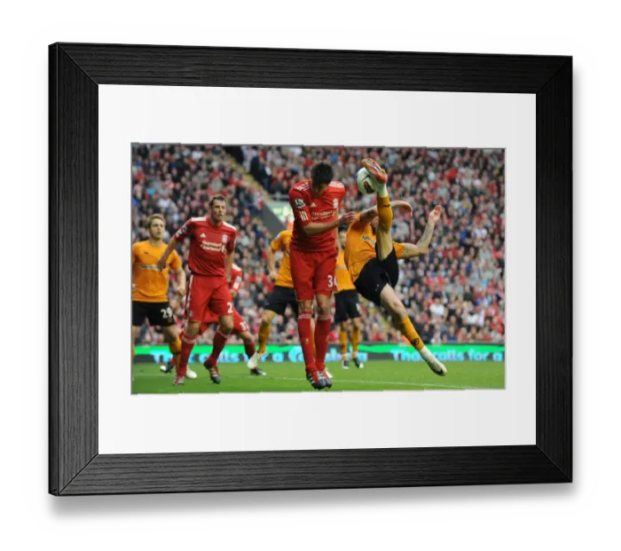 Framed Print : Steven Fletcher's Determined Shot at Goal for Wolverhampton Wanderers Against Liverpool (Barclays Premier League)