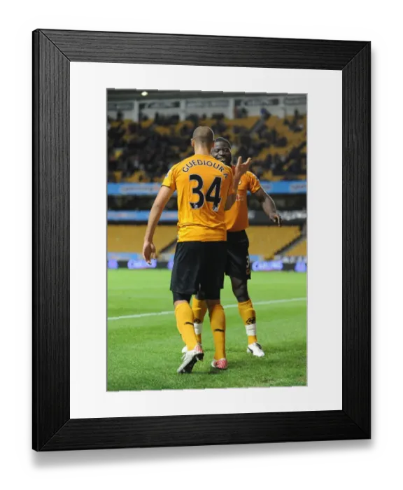 Framed Print : Wolverhampton Wanderers Triumph: Elokobi and Guedioura's Goals Secure 3-0 Carling Cup Victory over Millwall