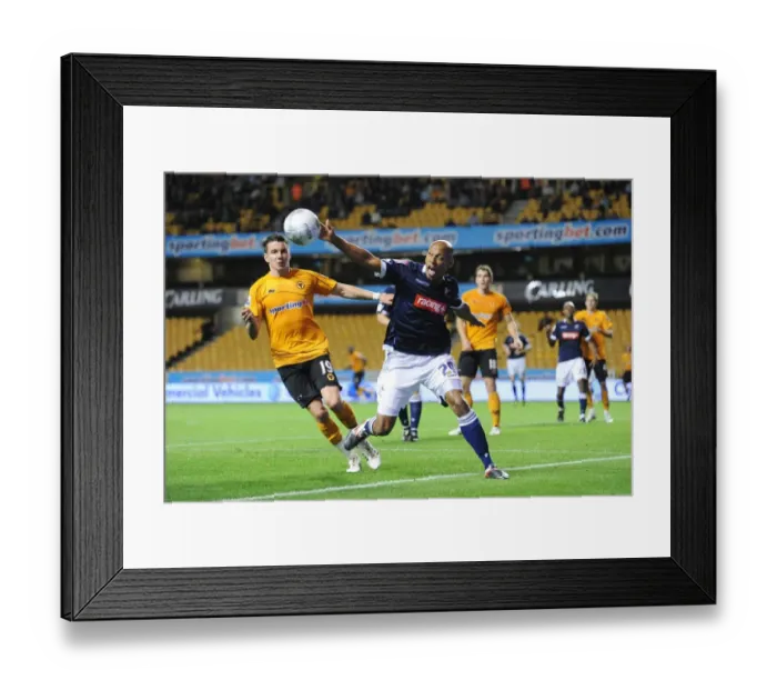 Framed Print : Controversial Moment in Wolverhampton Wanderers vs Millwall Carling Cup Match: Stewart's Handball Denies Hammill a Goal Framed Print : Controversial Moment in Wolverhampton Wanderers vs Millwall Carling Cup Match: Stewart's Handball Denies Hammill a Goal