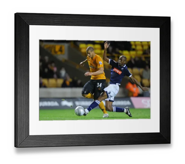 Framed Print : Clash of the Midfielders: Guedioura vs Abdou in Wolverhampton Wanderers vs Millwall Carling Cup Showdown Framed Print : Clash of the Midfielders: Guedioura vs Abdou in Wolverhampton Wanderers vs Millwall Carling Cup Showdown