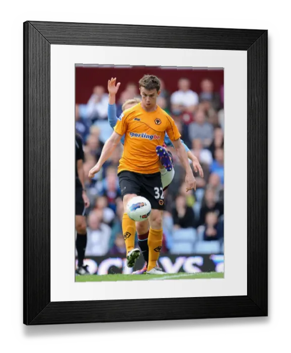 Framed Print : Intense Battle: Barry Bannan vs. Kevin Foley - Aston Villa vs. Wolverhampton Wanderers (Premier League Soccer) Framed Print : Intense Battle: Barry Bannan vs. Kevin Foley - Aston Villa vs. Wolverhampton Wanderers (Premier League Soccer)