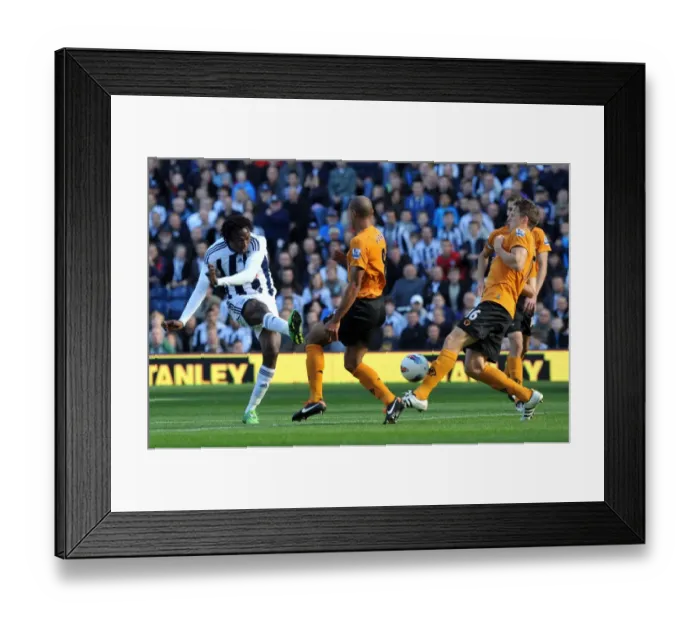 Framed Print : Tense Showdown: Tchoyi's Shot Thwarted by Henry and Berra (WBA vs. Wolverhampton Wanderers) Framed Print : Tense Showdown: Tchoyi's Shot Thwarted by Henry and Berra (WBA vs. Wolverhampton Wanderers)