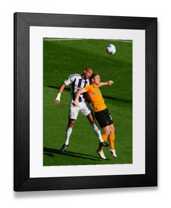 Framed Print : Reid vs. Doyle: A Battle in the Black Country - West Bromwich Albion vs. Wolverhampton Wanderers, Premier League Rivalry Framed Print : Reid vs. Doyle: A Battle in the Black Country - West Bromwich Albion vs. Wolverhampton Wanderers, Premier League Rivalry