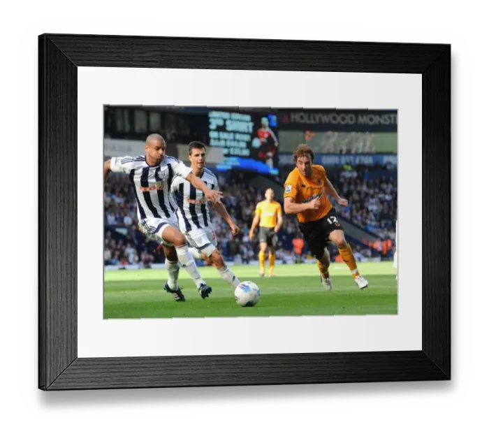 Framed Print : Wolverhampton Wanderers Stephen Hunt Slips Past Scharner and Reid in Intense Barclays Premier League Showdown Framed Print : Wolverhampton Wanderers Stephen Hunt Slips Past Scharner and Reid in Intense Barclays Premier League Showdown