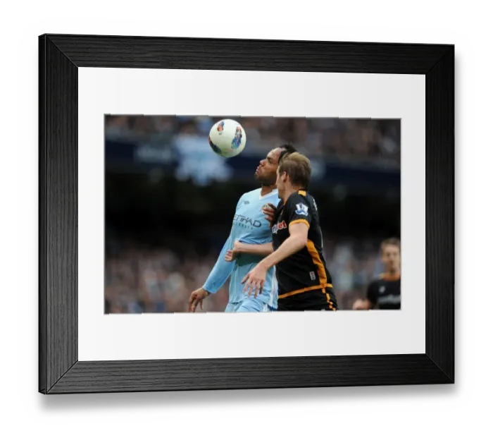 Framed Print : Lescott vs. Edwards: A Premier League Showdown - Manchester City vs. Wolverhampton Wanderers Framed Print : Lescott vs. Edwards: A Premier League Showdown - Manchester City vs. Wolverhampton Wanderers
