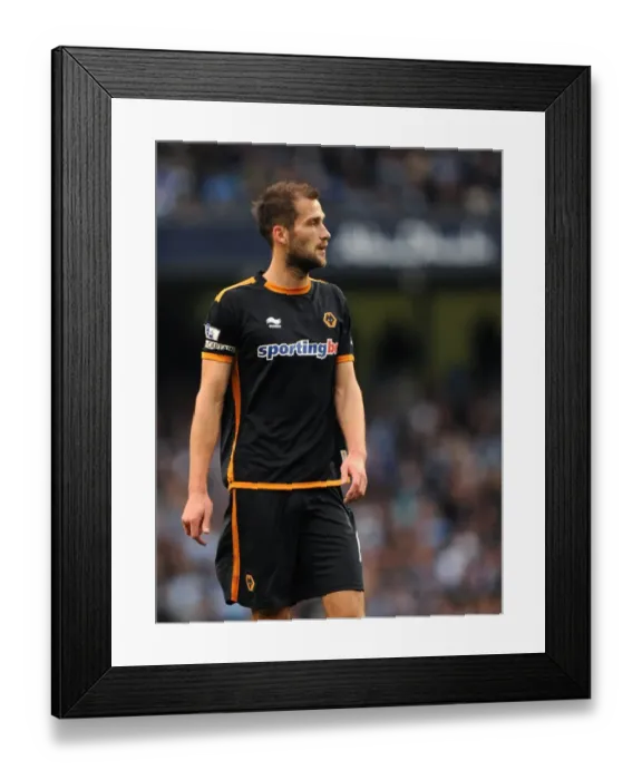 Framed Print : A Tense Moment in the Premier League: Roger Johnson's Focus Against Manchester City Framed Print : A Tense Moment in the Premier League: Roger Johnson's Focus Against Manchester City