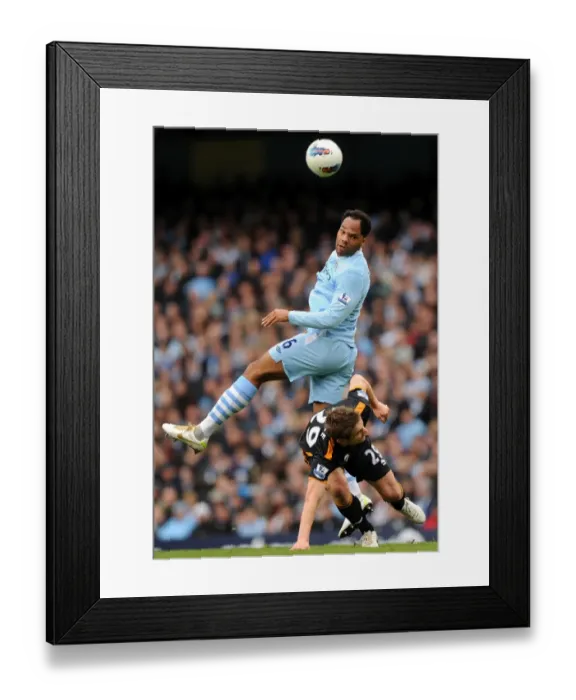 Framed Print : Premier League Showdown: Lescott vs. Doyle - Manchester City vs. Wolverhampton Wanderers Framed Print : Premier League Showdown: Lescott vs. Doyle - Manchester City vs. Wolverhampton Wanderers