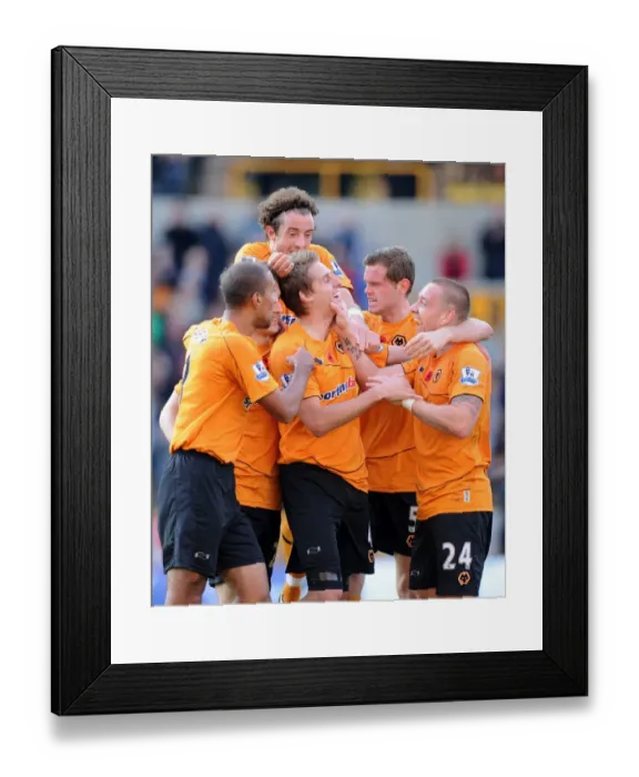 Framed Print : David Edwards Dramatic 2-1 Goal for Wolverhampton Wanderers vs. Wigan Athletic in the Barclays Premier League Framed Print : David Edwards Dramatic 2-1 Goal for Wolverhampton Wanderers vs. Wigan Athletic in the Barclays Premier League