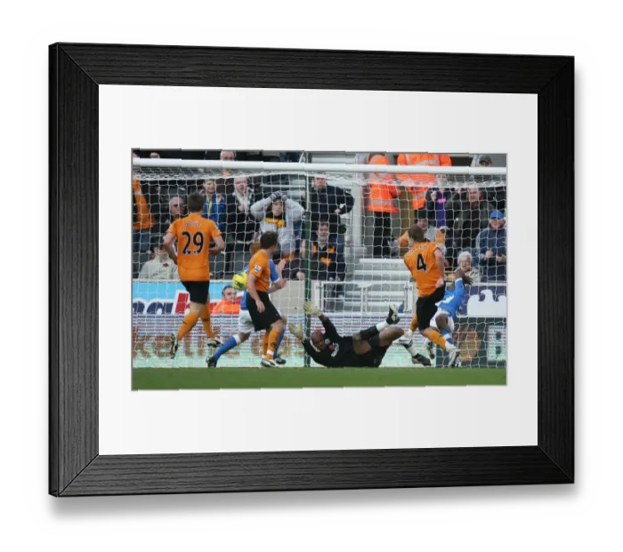 Framed Print : David Edwards Dramatic Comeback Goal: 2-1 for Wolverhampton Wanderers Against Wigan Athletic (Premier League) Framed Print : David Edwards Dramatic Comeback Goal: 2-1 for Wolverhampton Wanderers Against Wigan Athletic (Premier League)