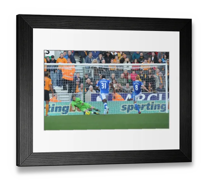 Framed Print : Wolverhampton Wanderers vs Wigan Athletic: Hennessey's Savage Save and Watson's Redemption Goal in the Premier League