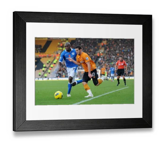 Framed Print : Matt Jarvis vs Emmerson Boyce: A Football Rivalry in the Barclays Premier League - Wolverhampton Wanderers vs Wigan Athletic