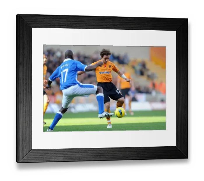 Framed Print : Clash between Hunt and Boyce: Wolverhampton Wanderers vs. Wigan Athletic in Premier League Soccer Framed Print : Clash between Hunt and Boyce: Wolverhampton Wanderers vs. Wigan Athletic in Premier League Soccer