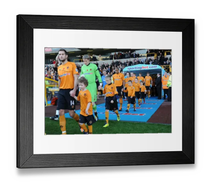 Framed Print : Mascot Clash: Wolves vs Wigan Athletic in the Barclays Premier League Framed Print : Mascot Clash: Wolves vs Wigan Athletic in the Barclays Premier League