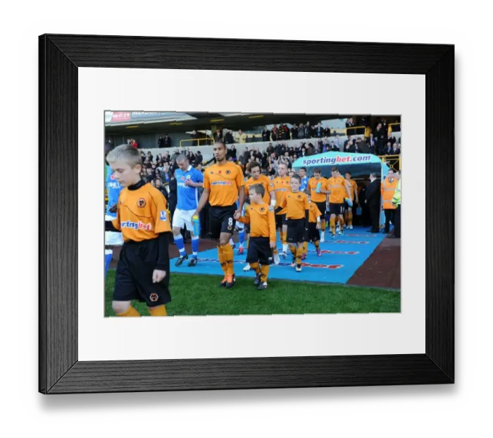 Framed Print : Exciting Mascot Showdown: Wolverhampton Wanderers vs Wigan Athletic - Barclays Premier League Framed Print : Exciting Mascot Showdown: Wolverhampton Wanderers vs Wigan Athletic - Barclays Premier League