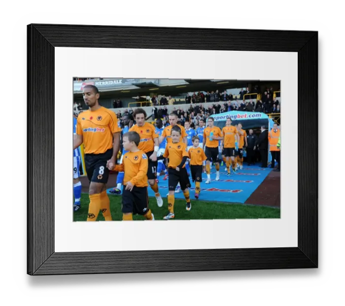 Framed Print : Wolverhampton Wanderers vs Wigan Athletic: A Mascot Showdown - Premier League Battle Framed Print : Wolverhampton Wanderers vs Wigan Athletic: A Mascot Showdown - Premier League Battle