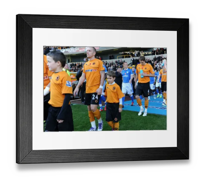 Framed Print : Mascot Showdown: Wolves vs. Wigan Athletic - Premier League Battle Framed Print : Mascot Showdown: Wolves vs. Wigan Athletic - Premier League Battle