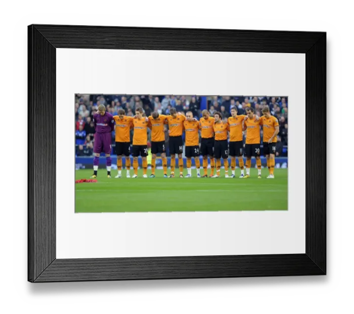 Framed Print : Wolverhampton Wanderers: A Moment of Respect - Everton vs. Wolverhampton Premier League Soccer Match - Silence Honored Framed Print : Wolverhampton Wanderers: A Moment of Respect - Everton vs. Wolverhampton Premier League Soccer Match - Silence Honored