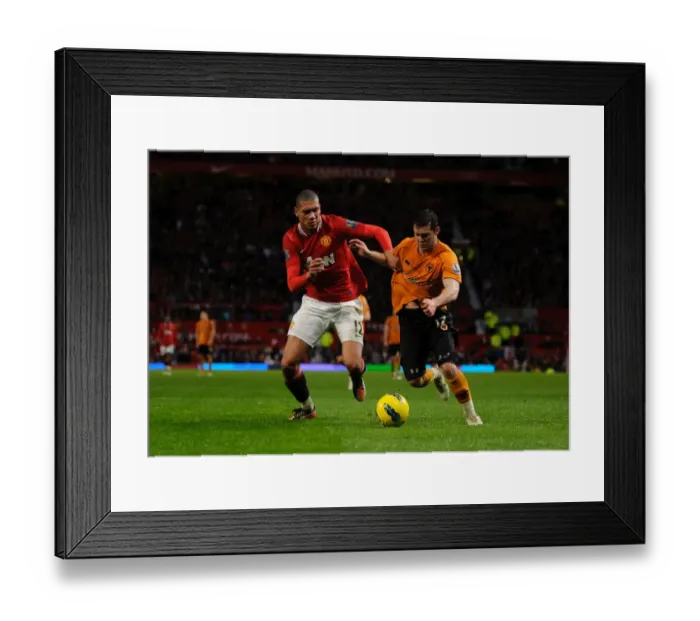 Framed Print : Clash of Titans: Smalling vs. Jarvis in Manchester United vs. Wolverhampton Wanderers Framed Print : Clash of Titans: Smalling vs. Jarvis in Manchester United vs. Wolverhampton Wanderers