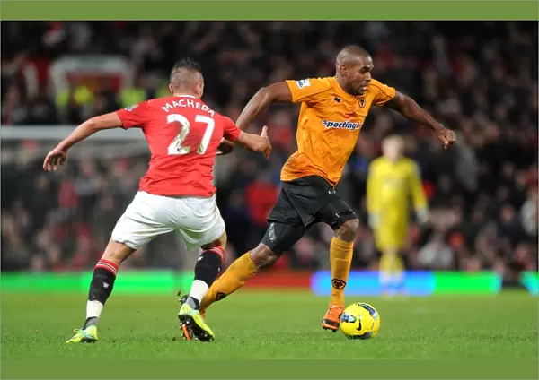 A Tactical Battle: Ronald Zubar of Wolverhampton Wanderers Focused Against Manchester United in Premier League Action