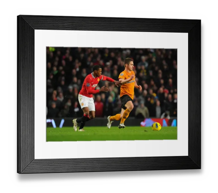 Framed Print : Manchester United vs. Wolverhampton Wanderers: Evra vs. Doyle - Premier League Clash Framed Print : Manchester United vs. Wolverhampton Wanderers: Evra vs. Doyle - Premier League Clash
