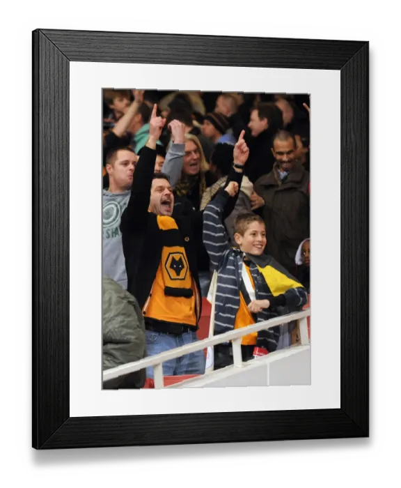 Framed Print : Passionate Clash: Arsenal vs. Wolverhampton Wanderers - Barclays Premier League Soccer Showdown: The Fans Battle Framed Print : Passionate Clash: Arsenal vs. Wolverhampton Wanderers - Barclays Premier League Soccer Showdown: The Fans Battle