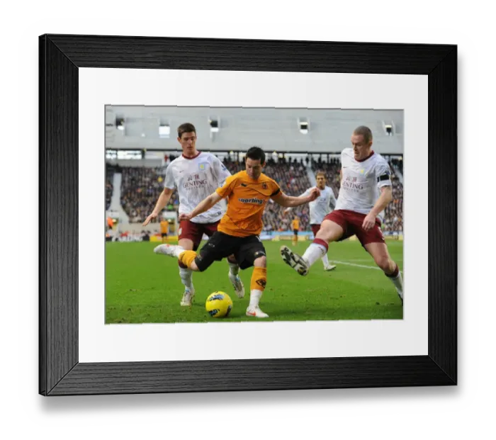 Framed Print : Intense Rivalry: Matt Jarvis vs. Aston Villa Defenders Ciaran Clark and Richard Dunne - A Wolverhampton Wanderers vs. Aston Villa Moment