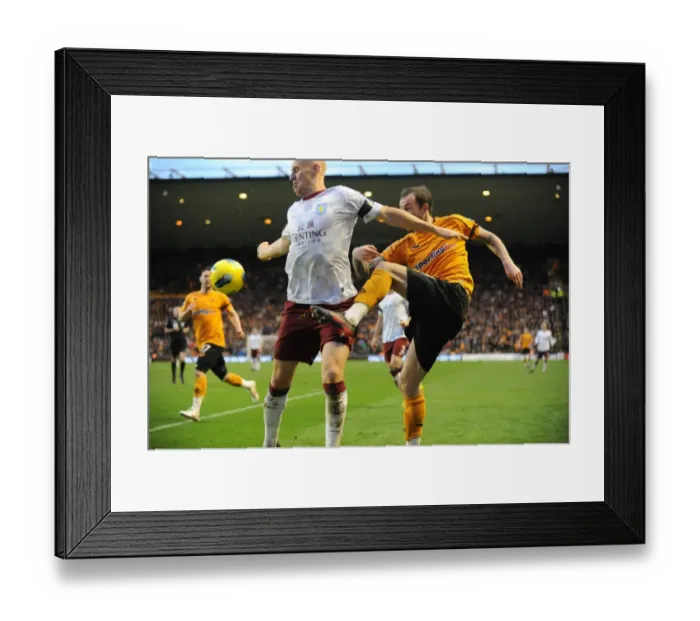 Framed Print : Clash of the Strikers: Steven Fletcher vs James Collins in Wolverhampton Wanderers vs Aston Villa (Barclays Premier League) Framed Print : Clash of the Strikers: Steven Fletcher vs James Collins in Wolverhampton Wanderers vs Aston Villa (Barclays Premier League)