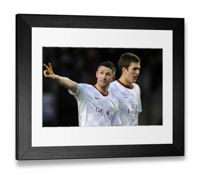 Framed Print : Robbie Keane's Double Strike: Wolverhampton Wanderers vs. Aston Villa - Barclays Premier League: Aston Villa Forward Scores Twice in Epic Rivalry Match