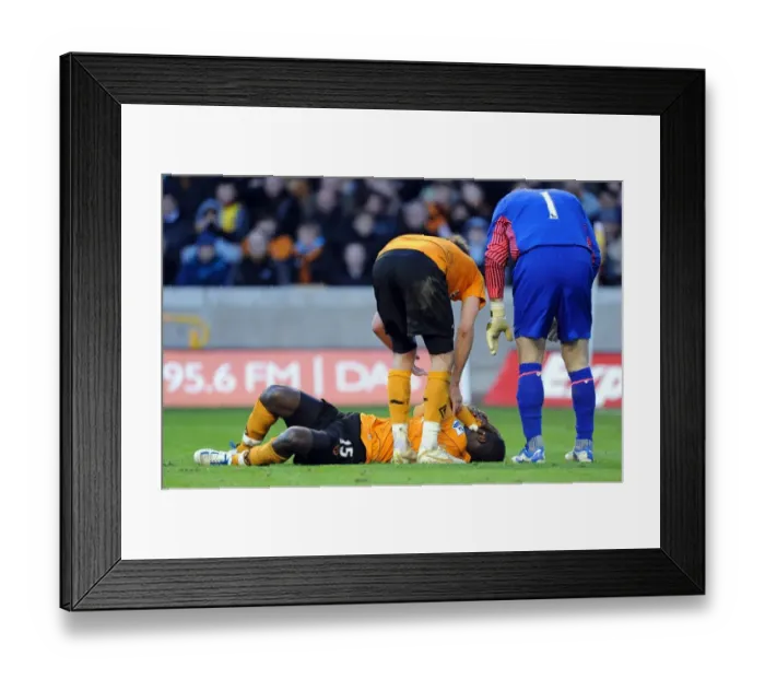 Framed Print : Wolverhampton Wanderers Emmanuel Frimpong Suffers Injury in Wolves vs Aston Villa Barclays Premier League Match