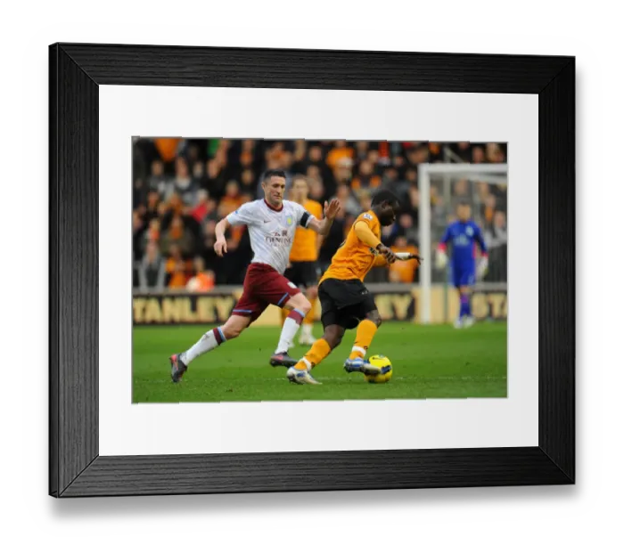 Framed Print : Clash of the Midlands: Keane vs. Frimpong - Wolverhampton Wanderers vs. Aston Villa in the Barclays Premier League Framed Print : Clash of the Midlands: Keane vs. Frimpong - Wolverhampton Wanderers vs. Aston Villa in the Barclays Premier League