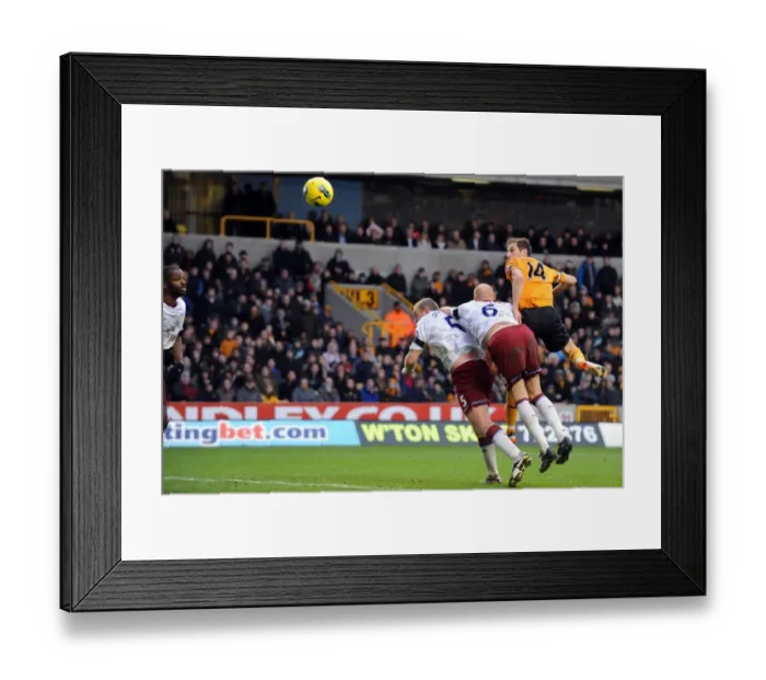 Framed Print : Johnson's Dramatic Header: Wolves Take a 2-1 Lead Over Aston Villa in Premier League Soccer