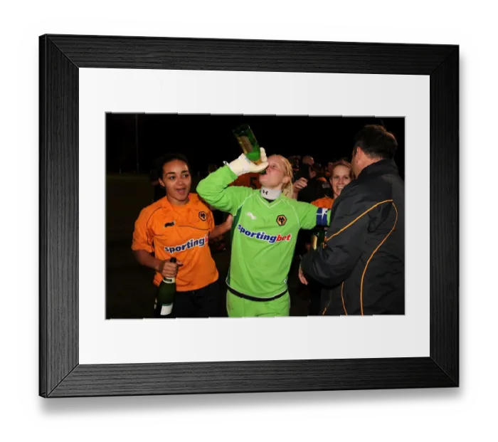 Framed Print : Players from Wolves Women celebrate after becoming Champions of the Midland Womens Combination League