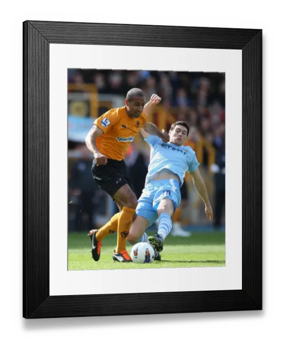 Framed Print : Midfield Showdown: Henry vs. Barry - Wolverhampton Wanderers vs. Manchester City Framed Print : Midfield Showdown: Henry vs. Barry - Wolverhampton Wanderers vs. Manchester City